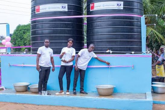 Children using a new handpump in Upper East